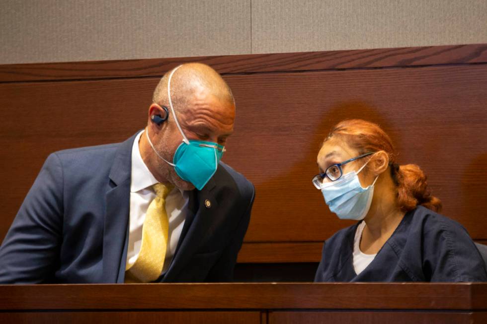 Jasmin Vargas communicates with her attorney, David Fischer, during a court hearing at the Regi ...