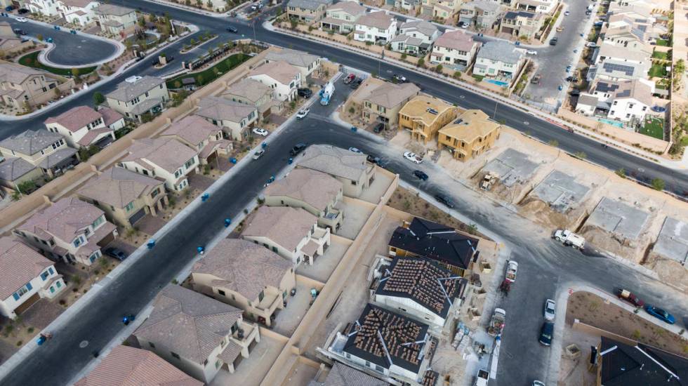 An aerial view of Woodlands at Skye Canyon, a housing development near Skye Village Road and Ea ...
