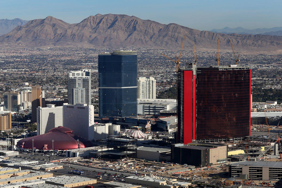 An aerial view of The Drew Hotel and Casino, center, and Resorts World, right, from the Goodyea ...