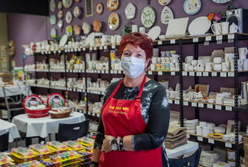 Co-founder of All Fired Up Gail Schomisch is seen in the paint-your-own pottery studio, on Tues ...