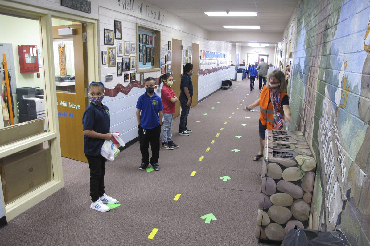 Students return to Greenbrae Elementary School in Sparks, Nev., for the first time since March ...