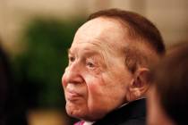 In this Nov. 16, 2018 photo, Sheldon Adelson watches President Donald Trump present his wife, M ...