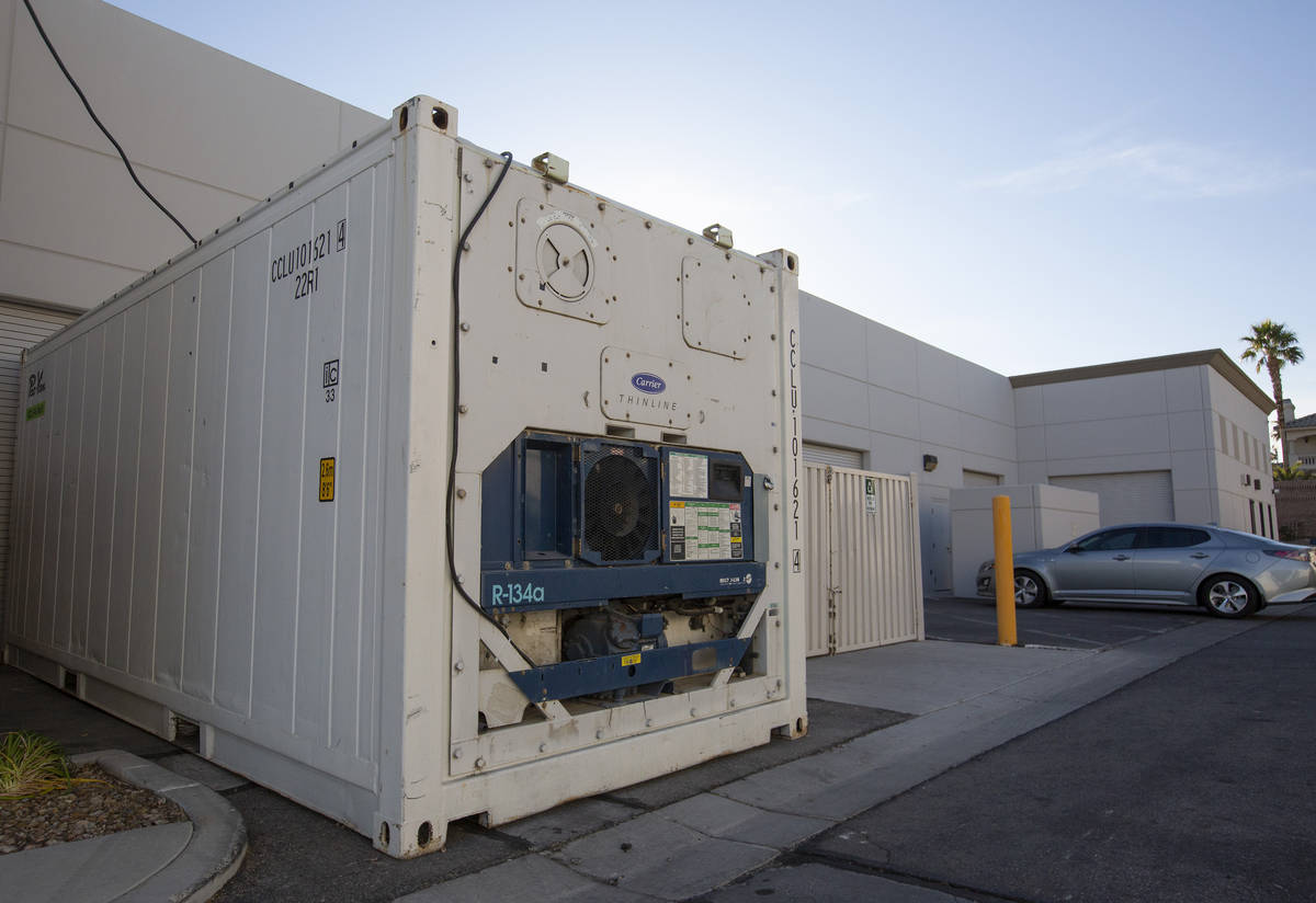 A refrigeration unit that holds bodies sits outside Kraft-Sussman Funeral and Cremation Service ...