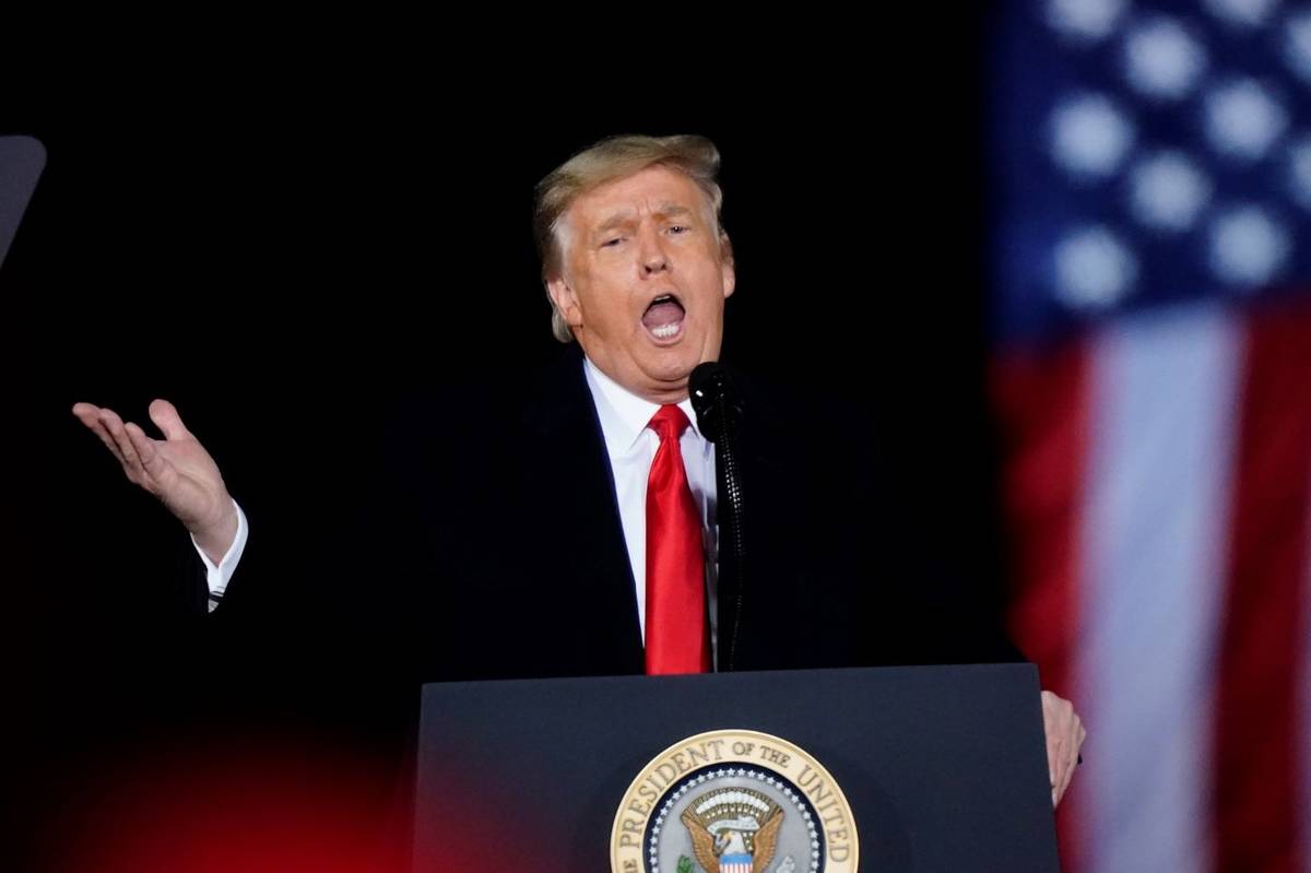 President Donald Trump speaks at a campaign rally in support of Senate candidates Sen. Kelly Lo ...