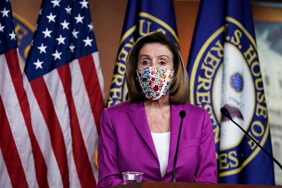 Speaker of the House Nancy Pelosi, D-Calif., holds a news conference on the day after violent p ...