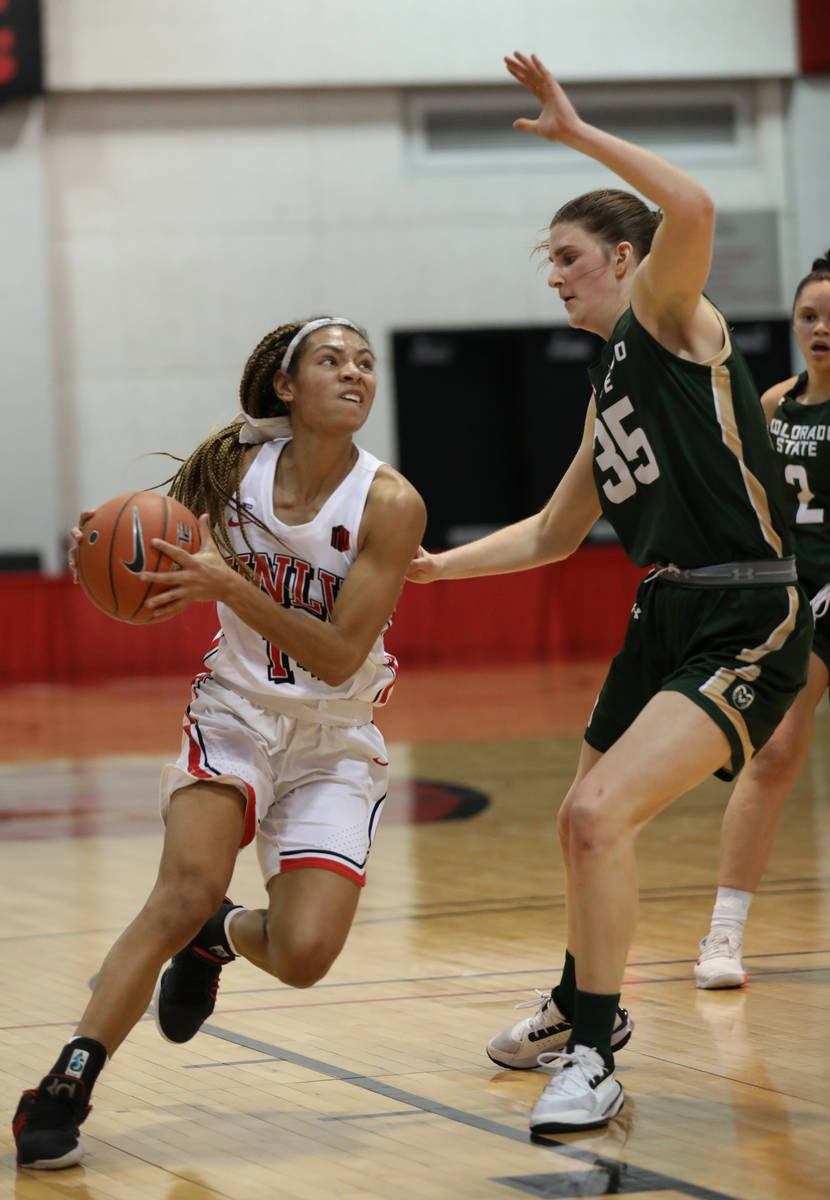 UNLV Lady Rebels guard Bailey Thomas (14) sets up for a lay-up against Colorado State Universit ...