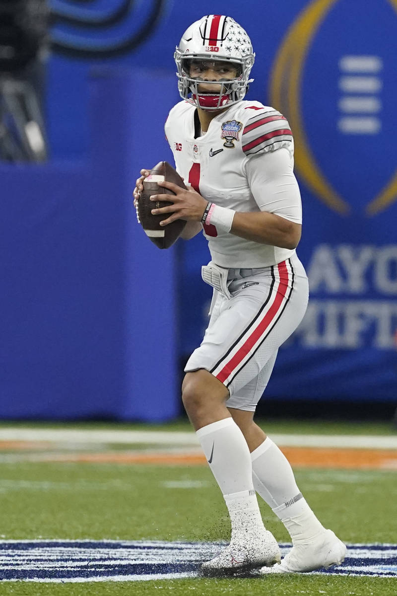 Ohio State quarterback Justin Fields passes against Clemson during the second half of the Sugar ...