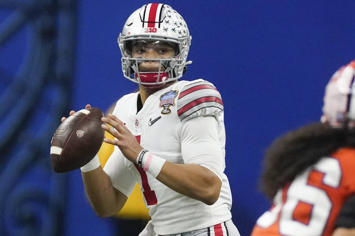 Ohio State quarterback Justin Fields passes against Clemson during the second half of the Sugar ...