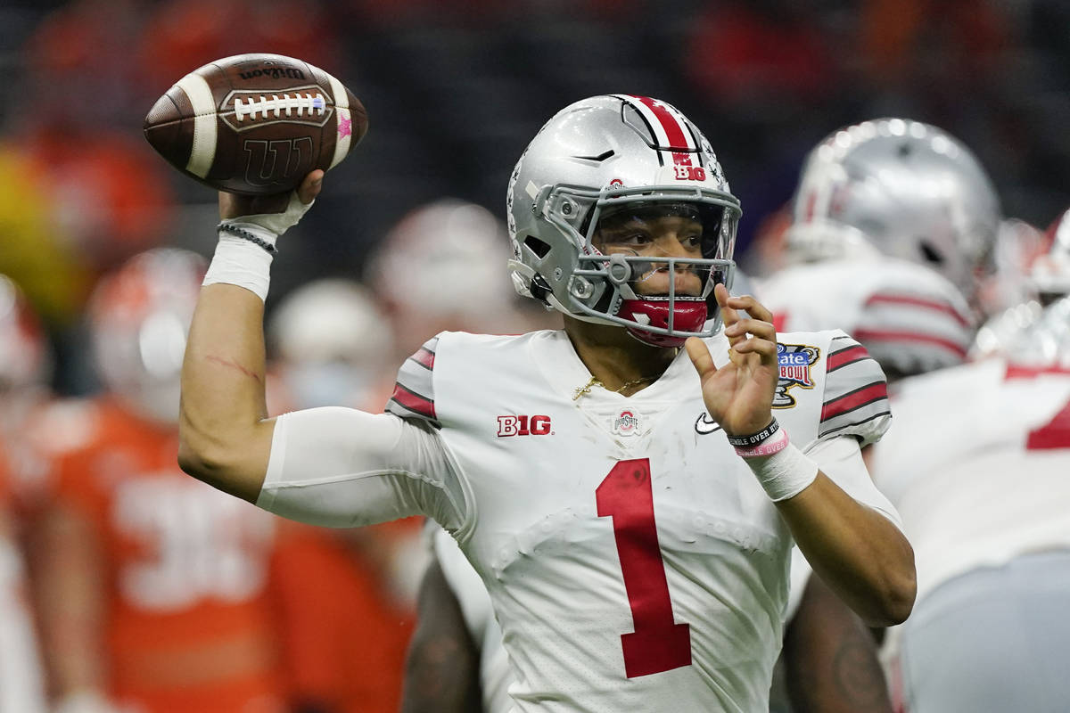 Ohio State quarterback Justin Fields passes against Clemson during the second half of the Sugar ...