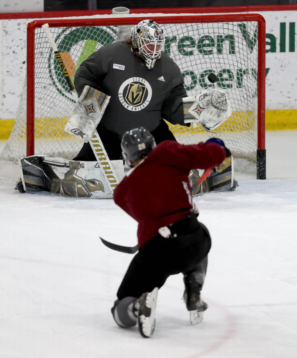 Golden Knights forward William Carrier shoots on goaltender Robin Lehner on the first day of tr ...
