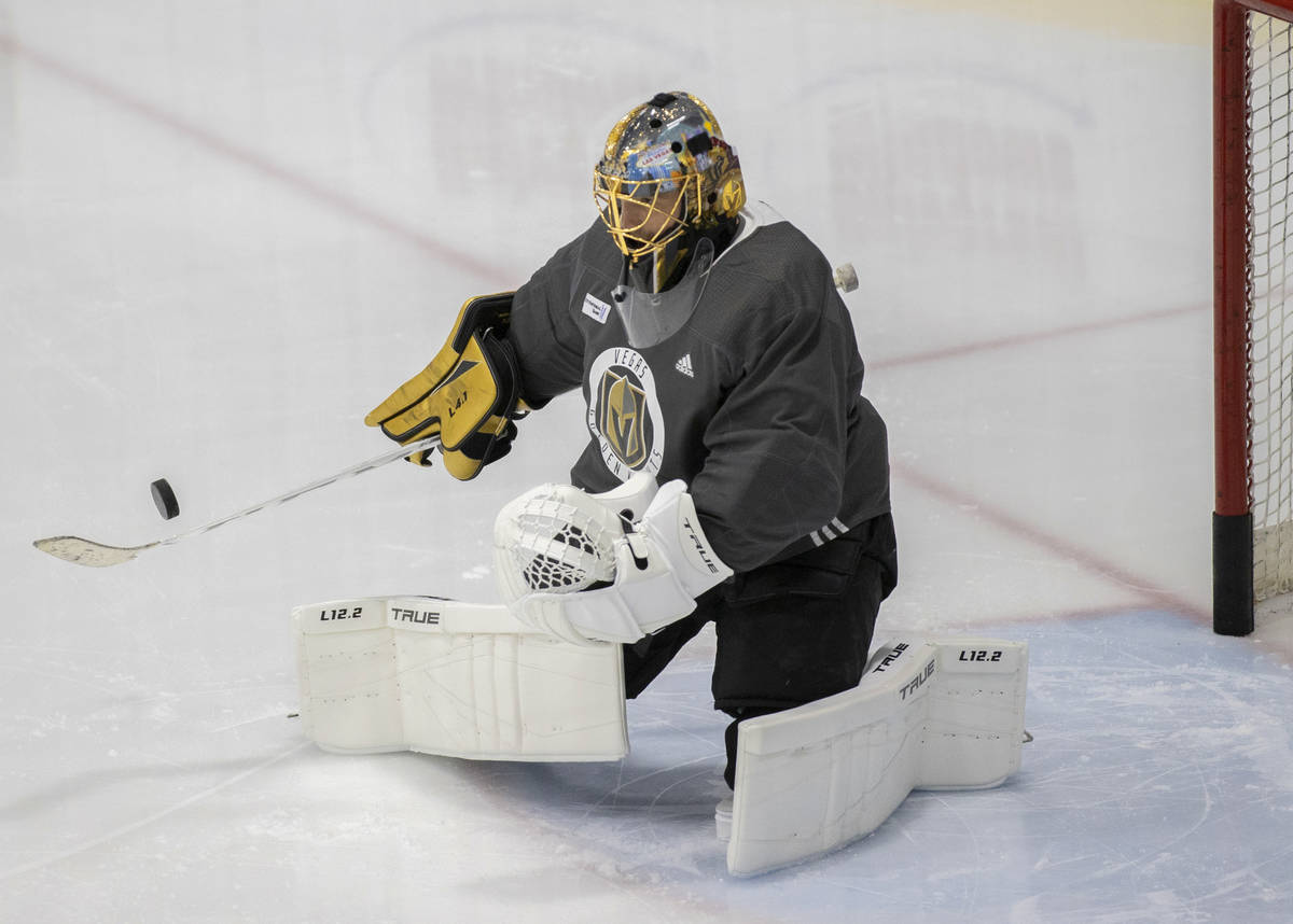 Golden Knights goaltender Marc-Andre Fleury (29) makes a save during practice at City National ...