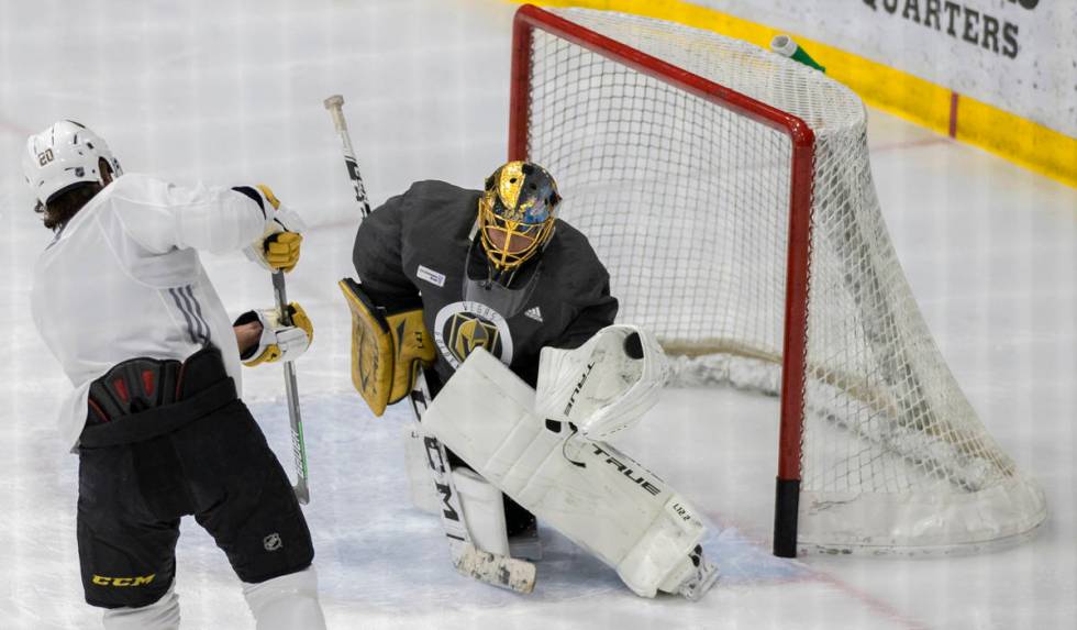 Golden Knights goaltender Marc-Andre Fleury (29) makes a save against Golden Knights forward Ch ...