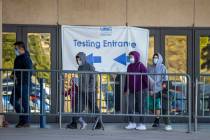 Patients enter as COVID-19 testing continues at the Cashman Center by University Medical Center ...