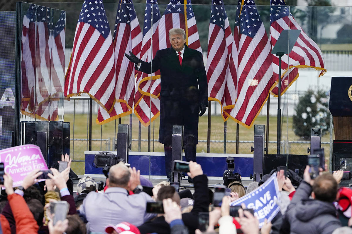 In this Jan. 6, 2021, photo, President Donald Trump arrives to speak at a rally in Washington. ...