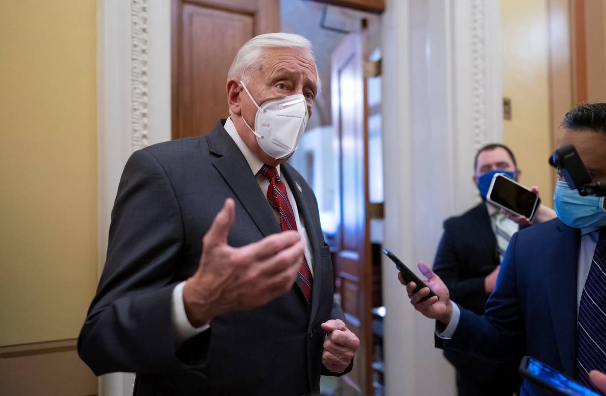 House Majority Leader Steny Hoyer, D-Md., talks to reporters just outside the House chamber aft ...