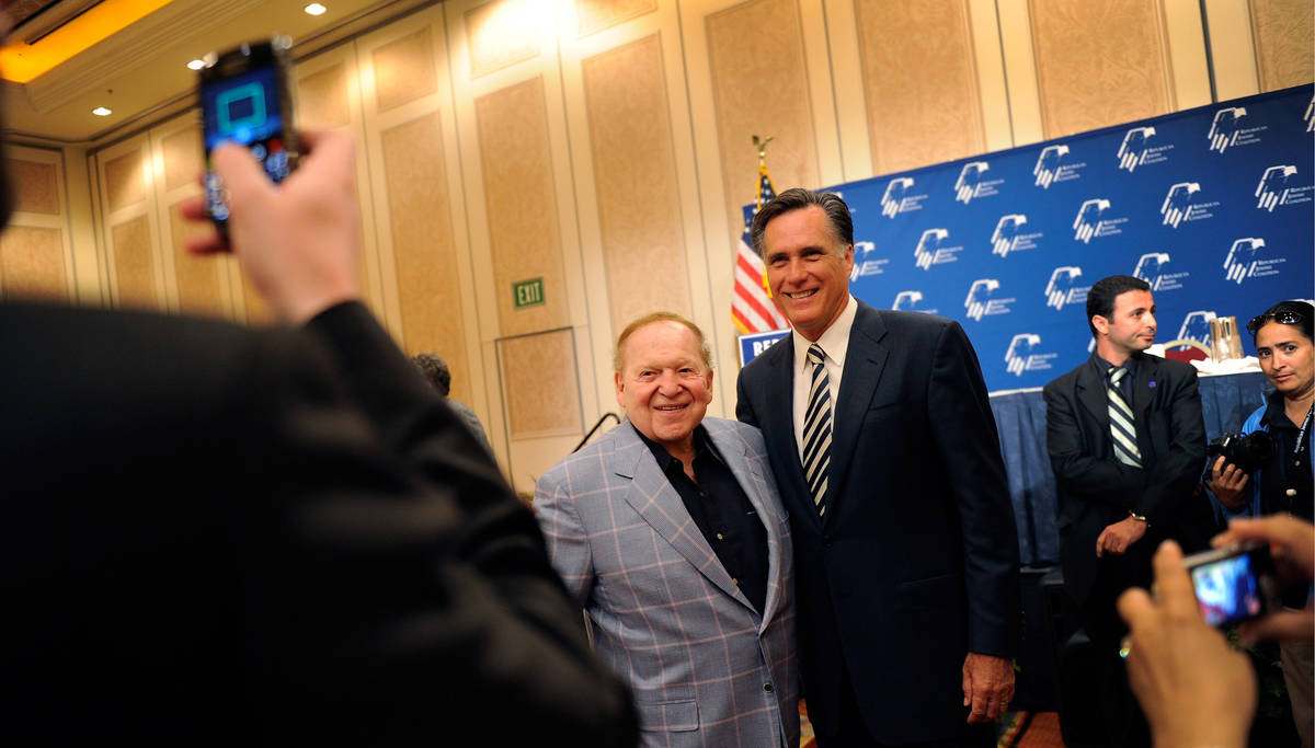 Las Vegas Sands Corp. Chairman and CEO Sheldon Adelson, left, and presidential candidate Mitt R ...
