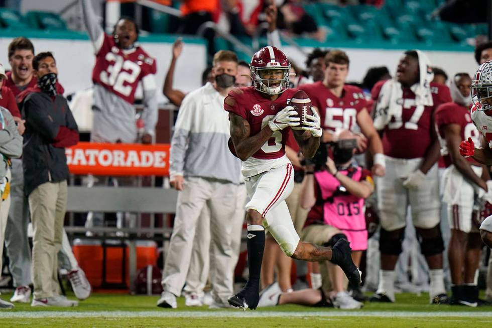 Alabama wide receiver DeVonta Smith catches a touchdown pass against Ohio State during the firs ...