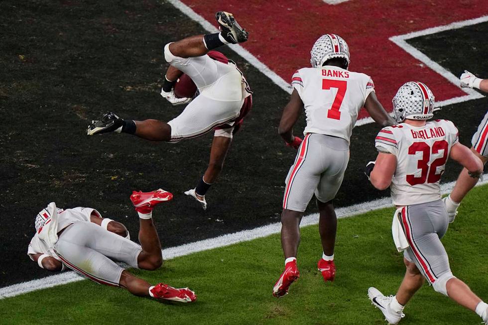 Alabama running back Najee Harris scores a touchdown against Ohio State during the first half o ...