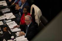 Regent Dean Gould, who is also chief of staff and special counsel to the board, speaks alongsid ...