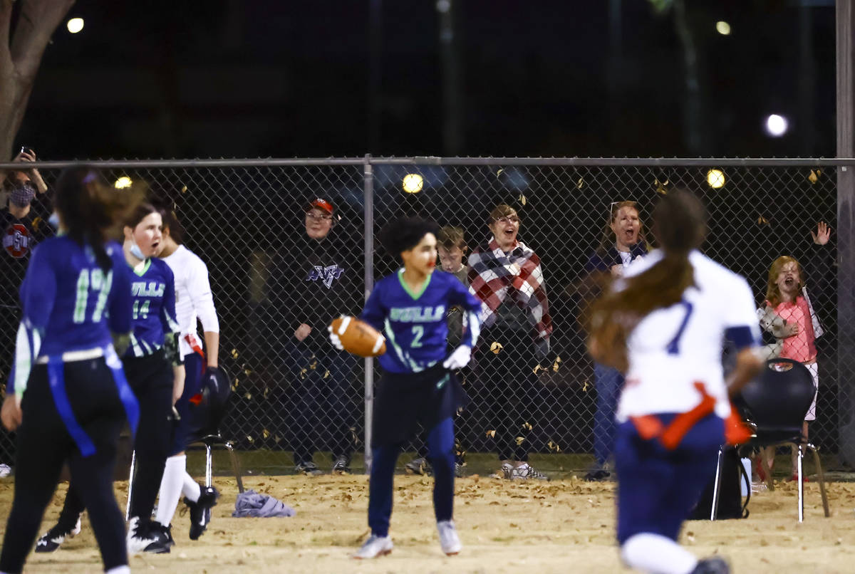 People watch the action from the sidewalk as Amplus Academy takes on SLAM! Nevada during a flag ...