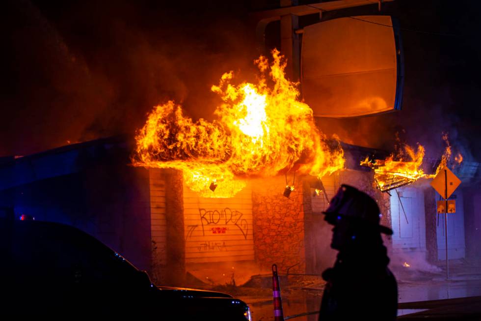 Las Vegas firefighters battle flames engulfing a vacant wedding chapel at 1431 S. Las Vegas Blv ...