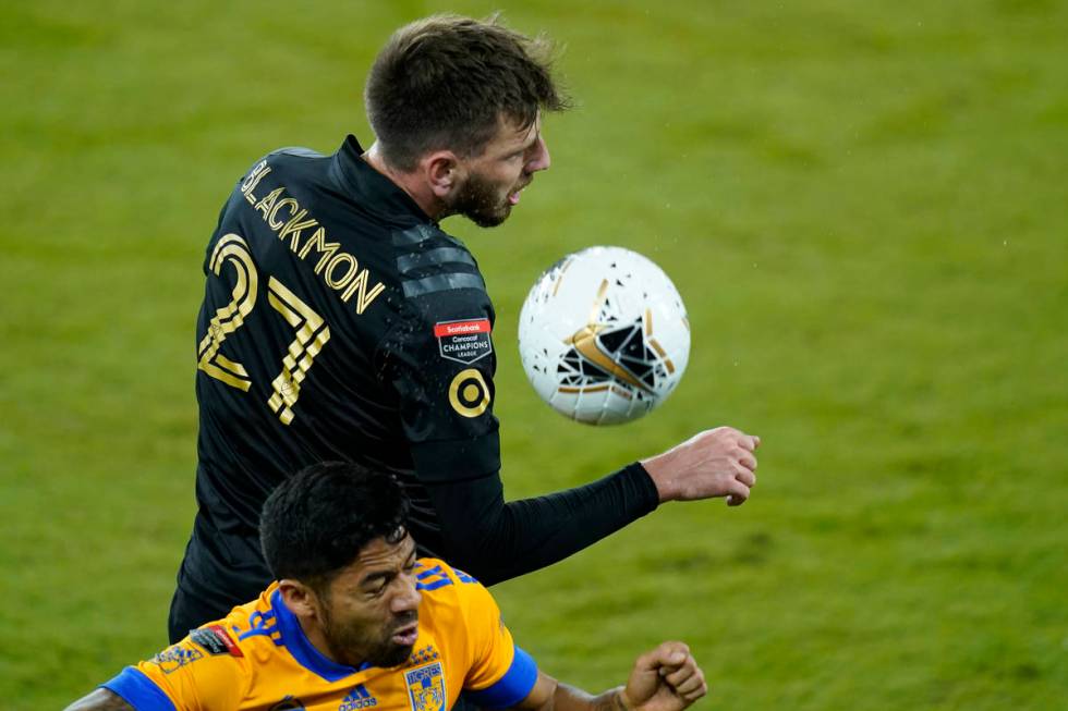 Los Angeles FC defender Tristan Blackmon (27) gets position on the ball in front of Tigres midf ...