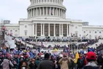 Trump supporters gather outside the Capitol on Wednesday, Jan. 6, 2021, in Washington. As Congr ...