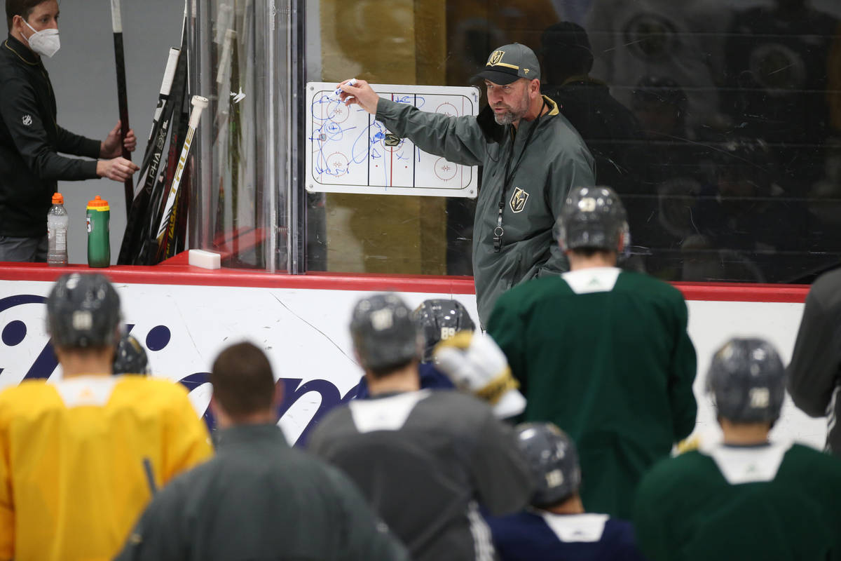 Vegas Golden Knights head coach Peter DeBoer talks to his team during a practice at City Nation ...