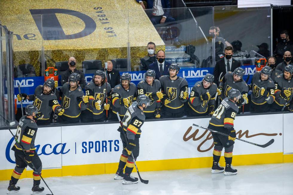 Golden Knights center Jonathan Marchessault (81) celebrates his goal with teammates during the ...