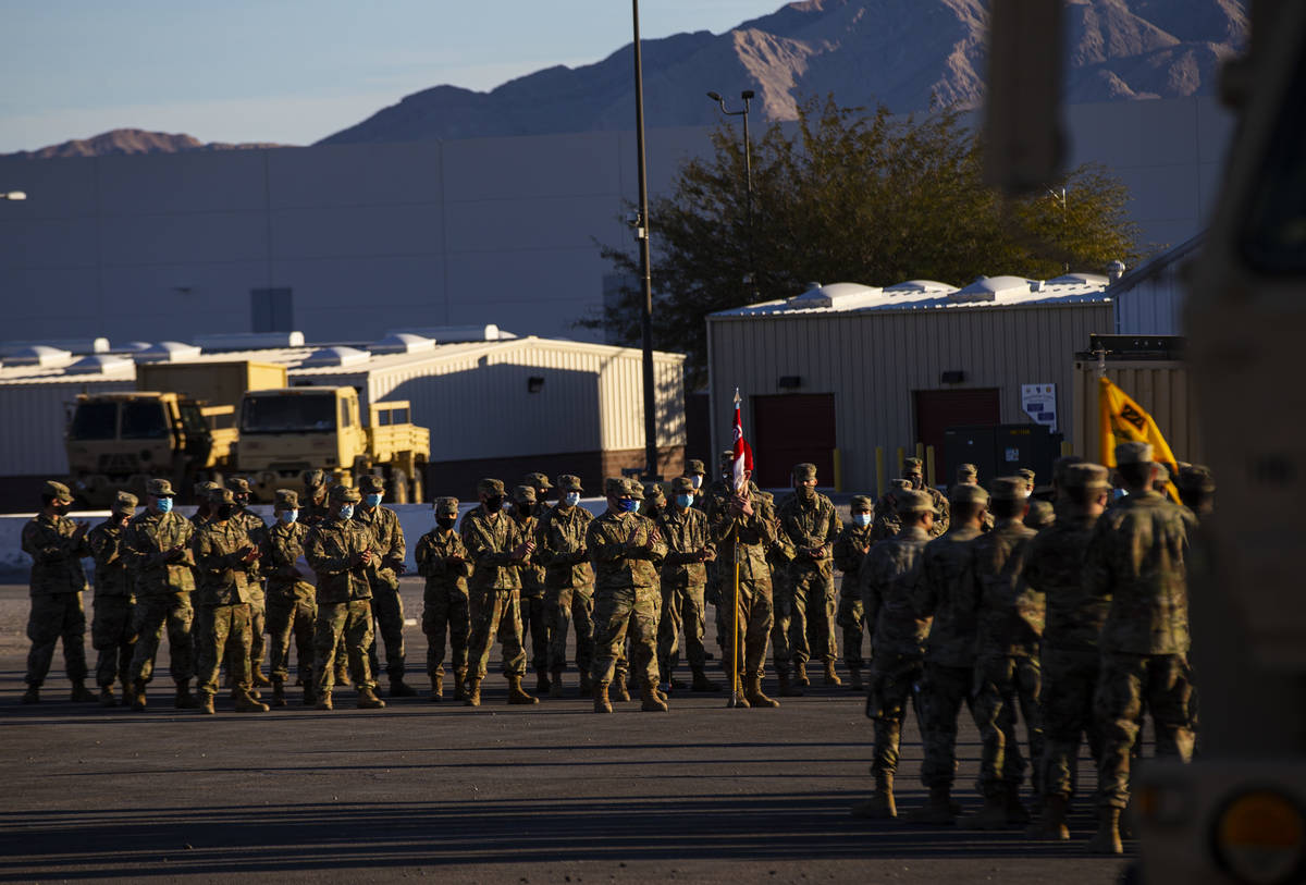 Members of the Nevada Army Guard listen to Maj. Gen. Ondra Berry, not pictured, on Thursday, Ja ...