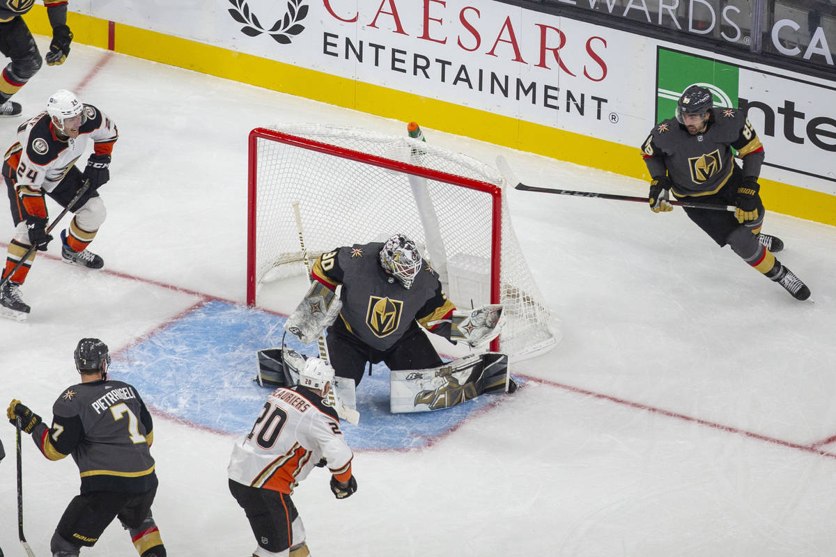 Vegas Golden Knights goaltender Robin Lehner (90) makes a save during the third period of an NH ...