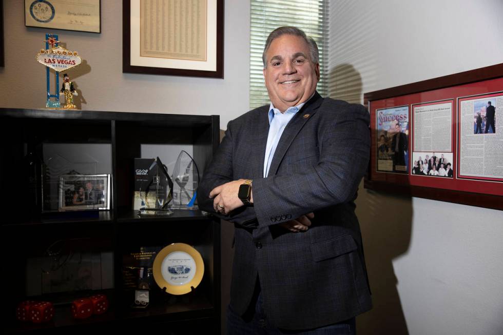 Thomas Blanchard, managing broker for Signature Real Estate Group, poses for a portrait at his ...