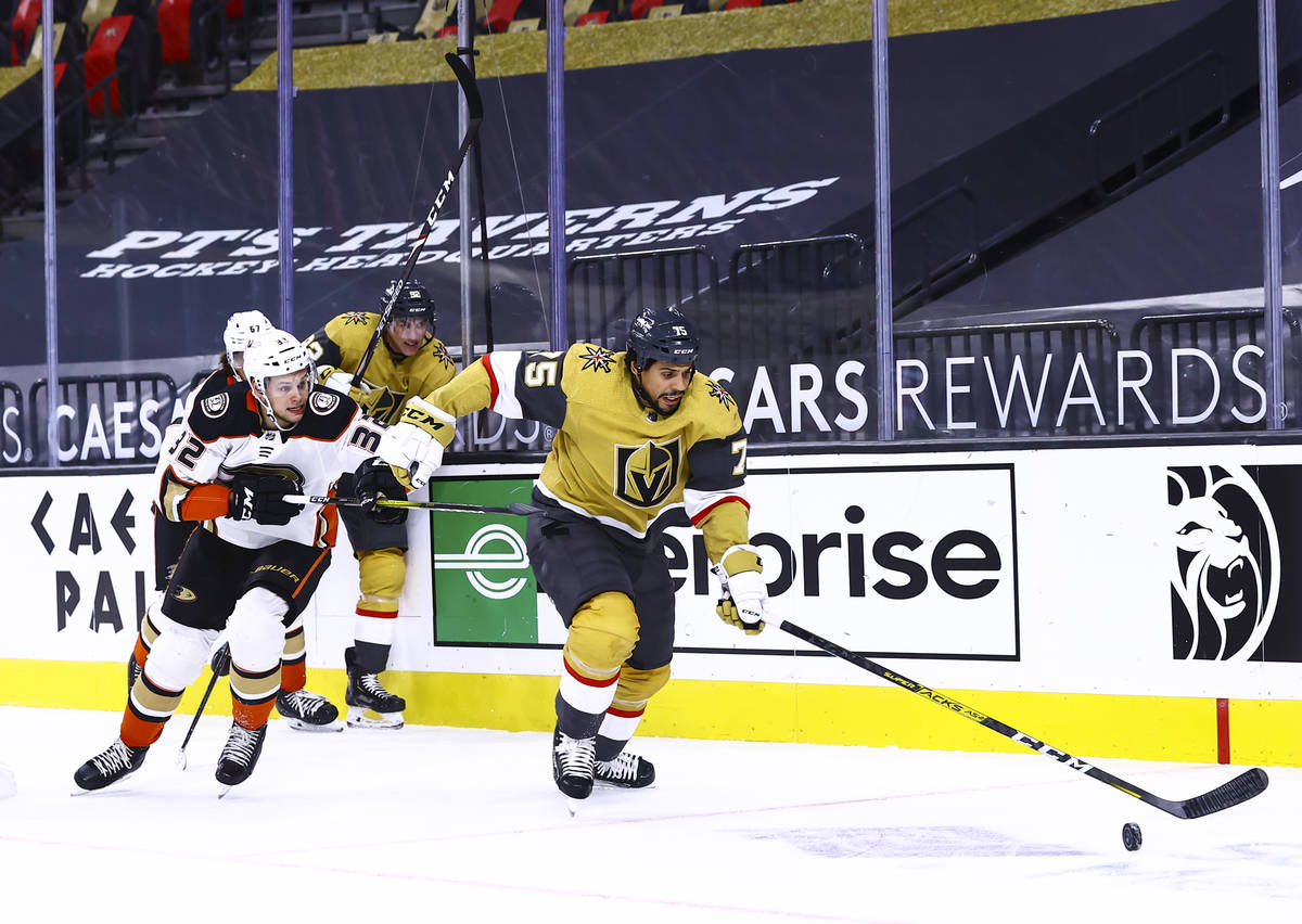 Golden Knights right wing Ryan Reaves (75) chases after the puck in front of Anaheim Ducks defe ...