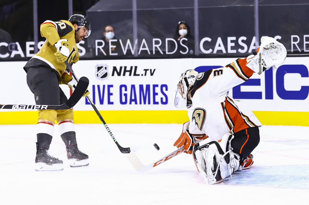 Anaheim Ducks goaltender John Gibson (36) blocks a shot by Golden Knights center Chandler Steph ...