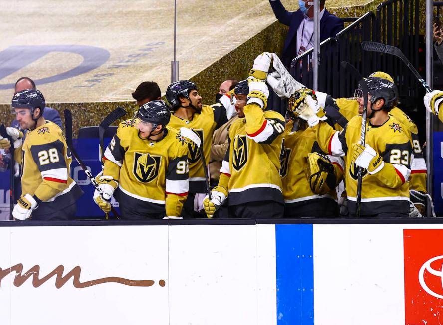 The Golden Knights celebrate a goal by center William Karlsson, not pictured, during the third ...