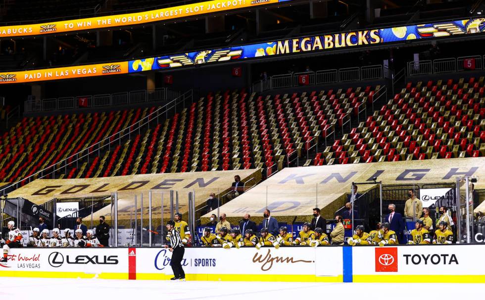 The Golden Knights watch from the bench as they play the Anaheim Ducks during the third period ...