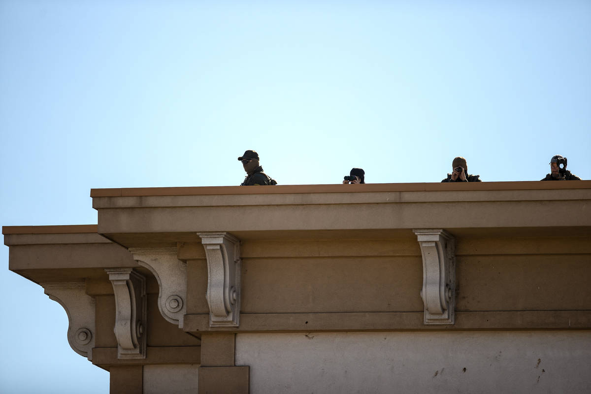 Law enforcement keep watch over the state Capitol complex on Sunday, Jan. 17, 2021, in Carson C ...