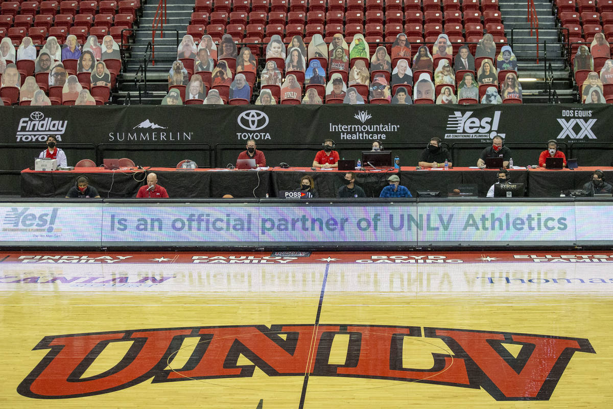 Cardboard cutouts of fans are seen in the stands during the first half of an NCAA men's basketb ...