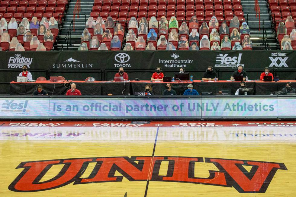 Cardboard cutouts of fans are seen in the stands during the first half of an NCAA men's basketb ...