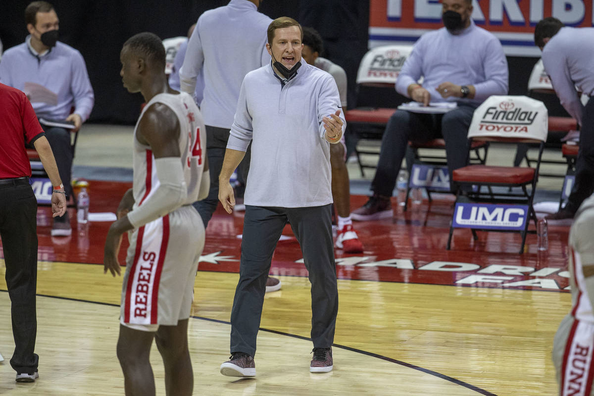 UNLV Rebels head coach T.J. Otzelberger coaches during the first half of an NCAA men's basketba ...