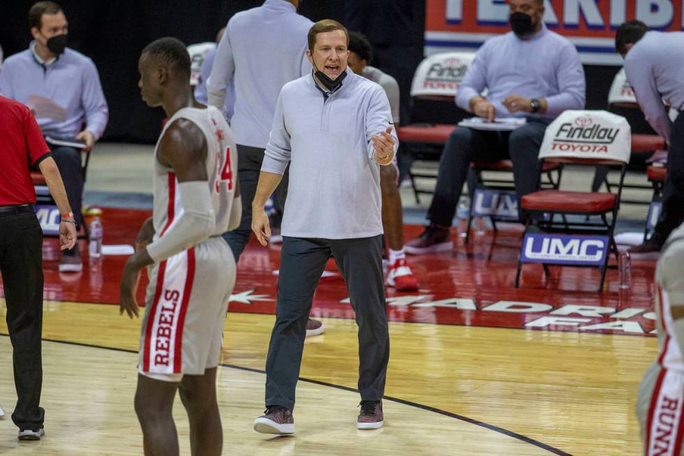 UNLV Rebels head coach T.J. Otzelberger coaches during the first half of an NCAA men's basketba ...