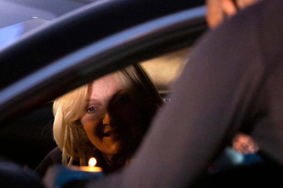 Heidi Sarno Straus lights Ner Neshama at a tribute to Sheldon Adelson outside the Israeli-Ameri ...