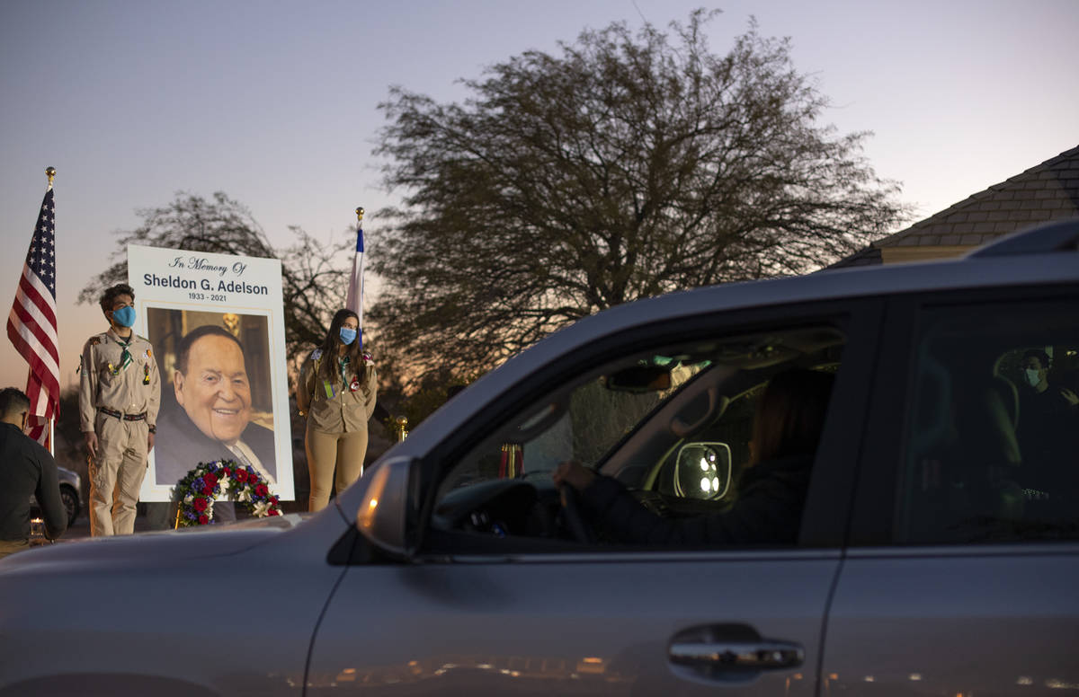 Members of the Jewish community pay their respects to Sheldon Adelson by participating in a dri ...