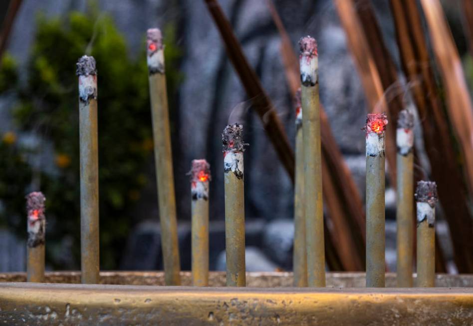 Incense smokes about copper leaves as the Bellagio Conservatory & Botanical Gardens debut its d ...