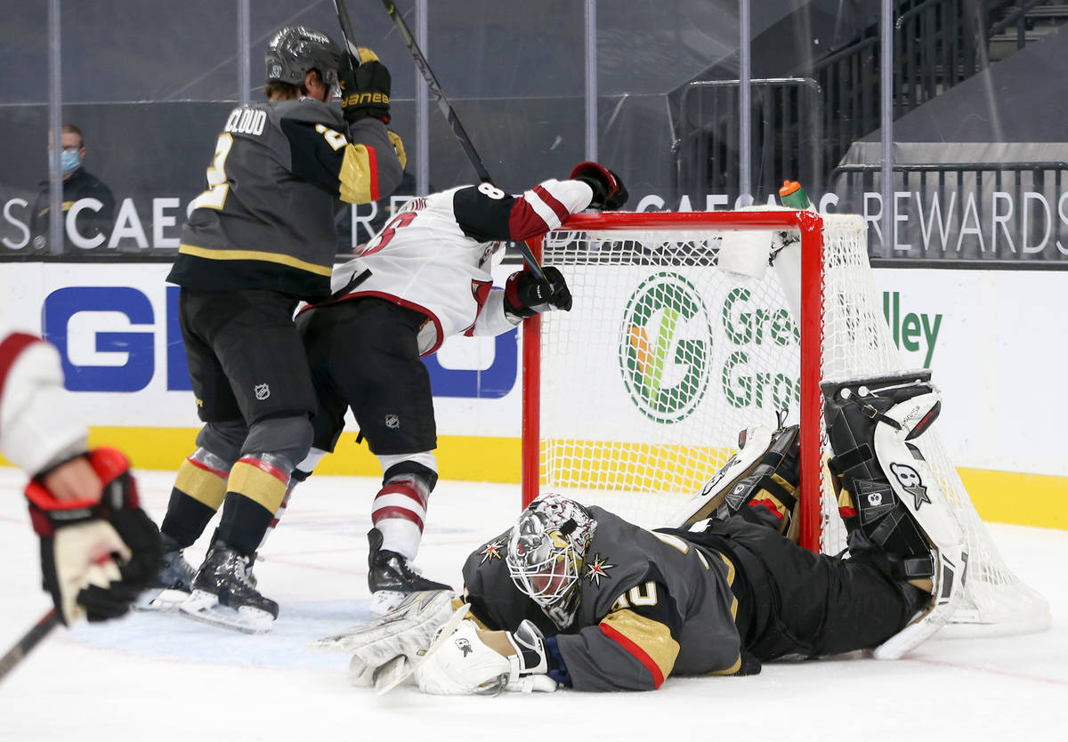 Vegas Golden Knights goaltender Robin Lehner (90) dives to save a shot on goal by the Arizona C ...