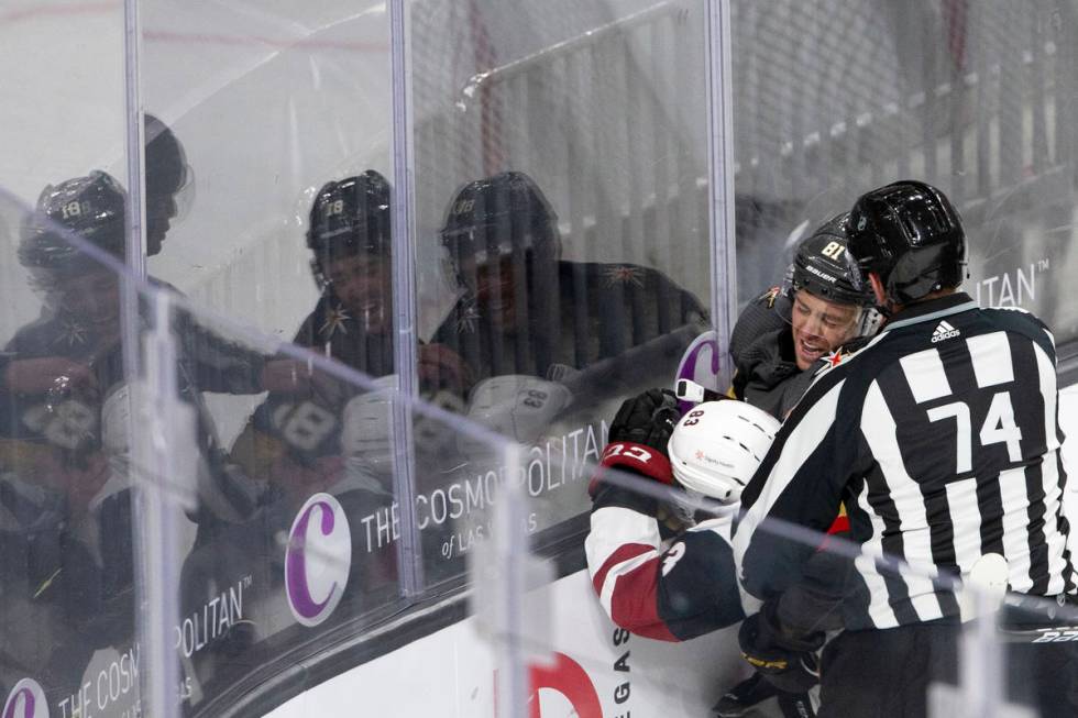 Golden Knights' center Jonathan Marchessault (81) gets in a fight with Arizona Coyotes' right w ...