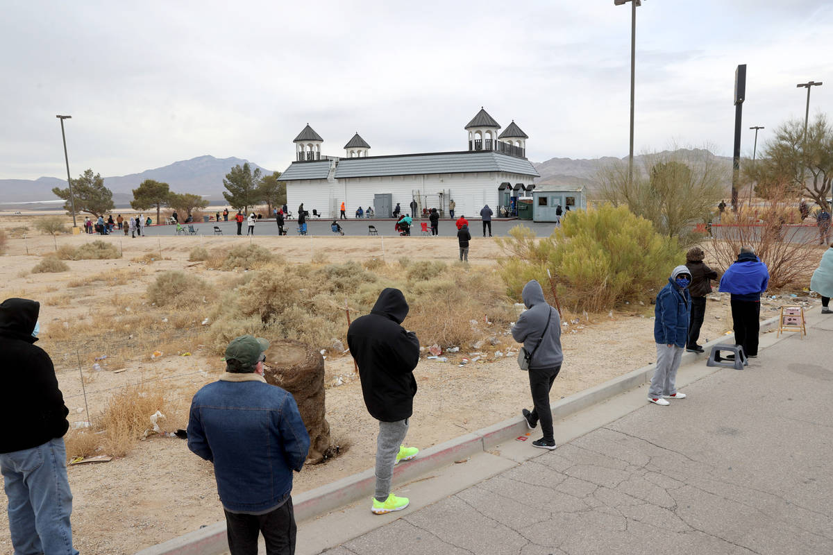 People line up to buy Powerball and Mega Millions lottery tickets at the Primm Valley Lotto Sto ...