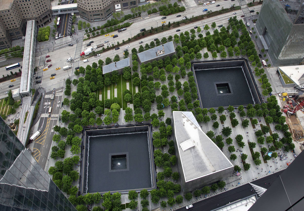 FILE - In this June 7, 2018, file photo, the September 11 Memorial and Museum are seen from an ...