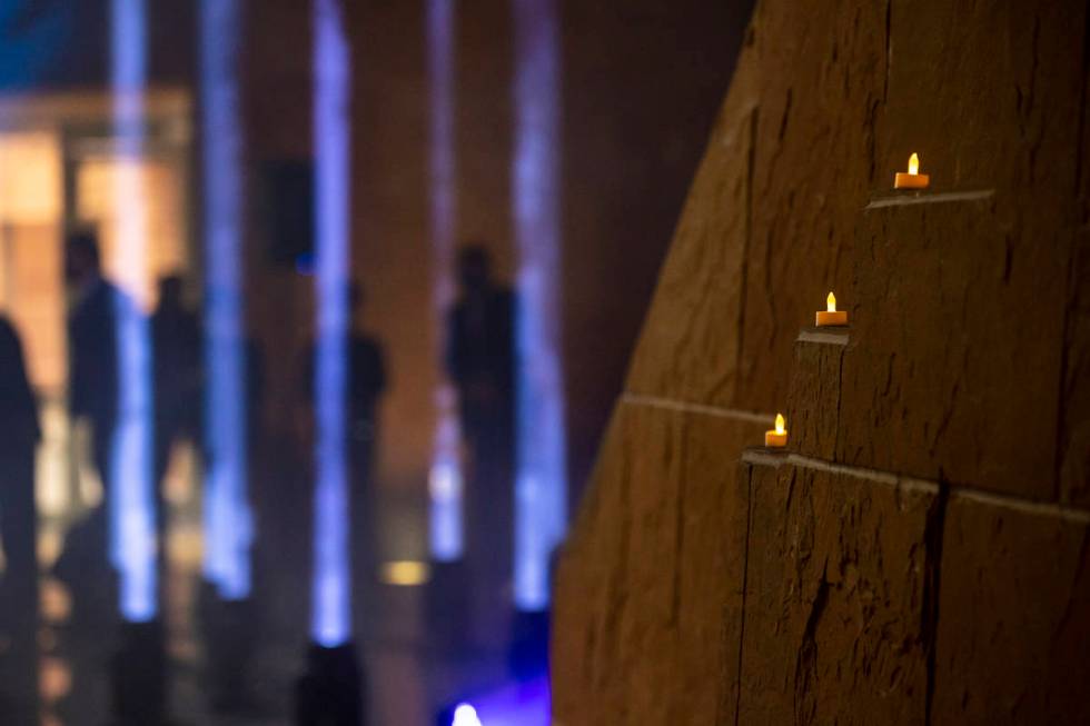 Candles are pictured as 29 lights illuminate the rotunda at the Clark County Government Center ...