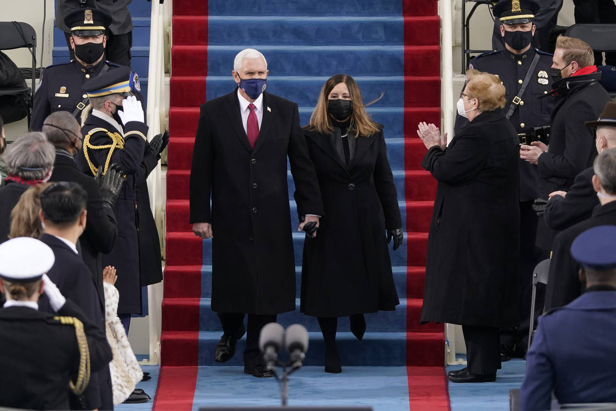 Vice President Mike Pence and his wife Karen, arrive for the 59th Presidential Inauguration at ...